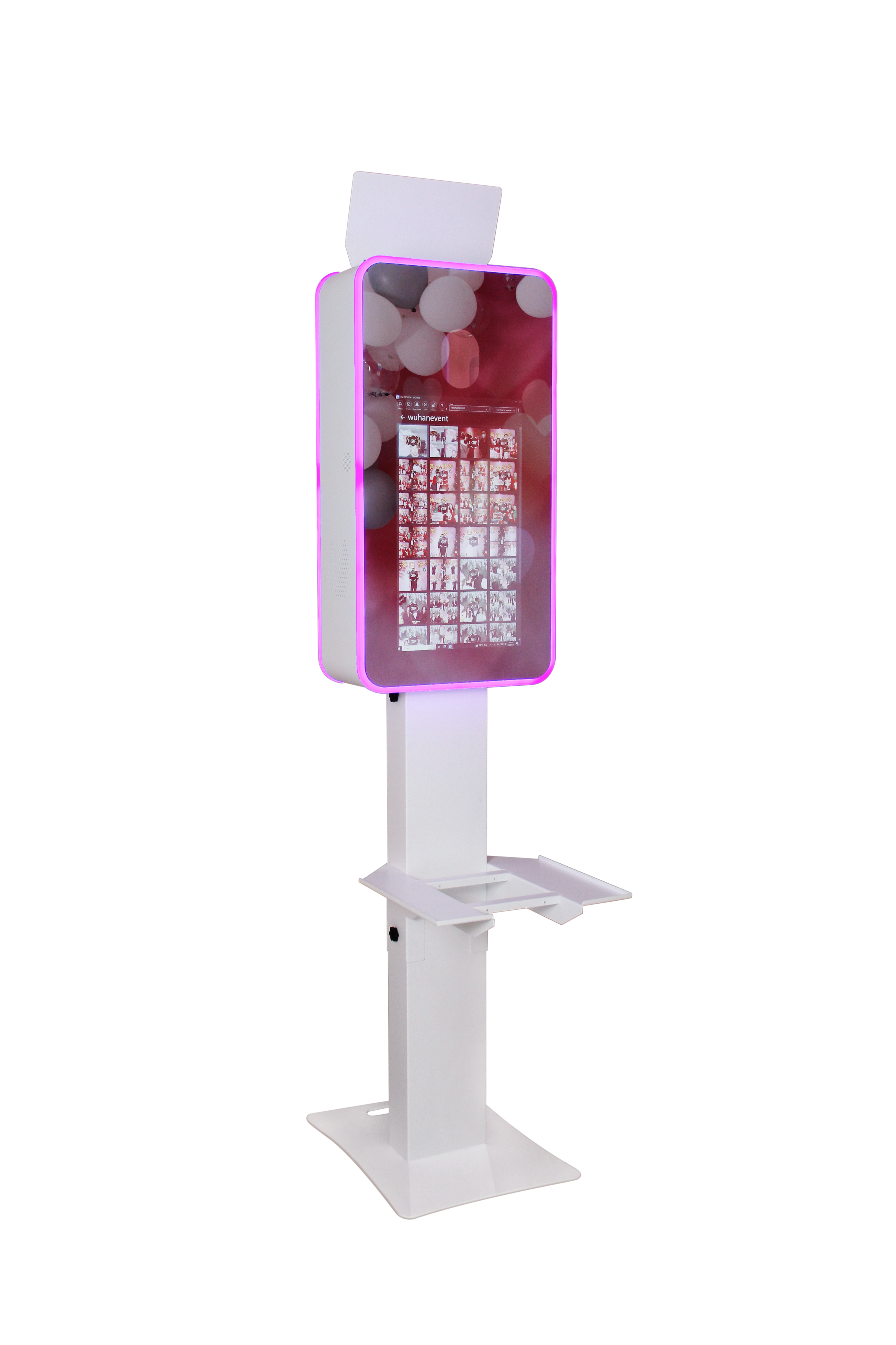 Mirror photo booth touch screen on white stand with pink LED frame