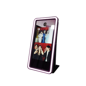 Titan Mirror Photo Booth with 62-inch touch screen, DSLR camera, sleek mirror design, ideal for events and photo sessions.
